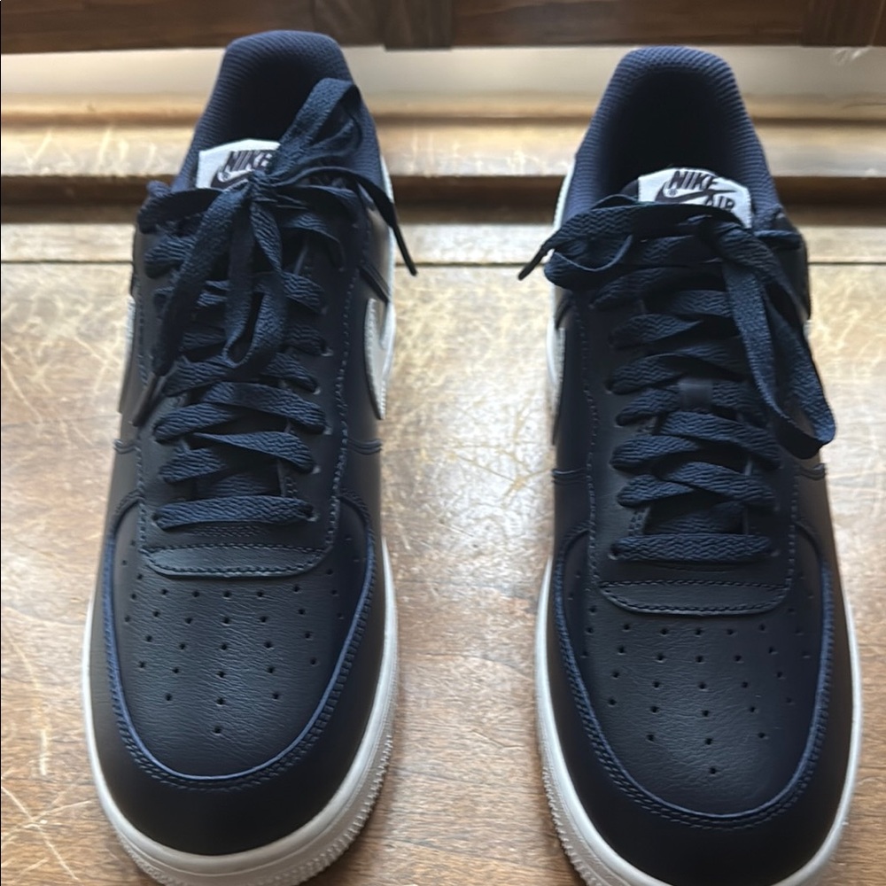 Nike Blue and White Sneakers with Iconic Design